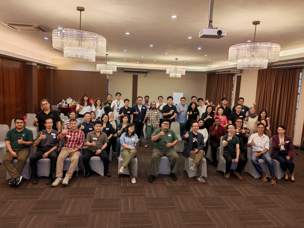 Full cohort of participants from a leading energy provider at the close of the Working Backwards and vibe-coding AI training workshop.